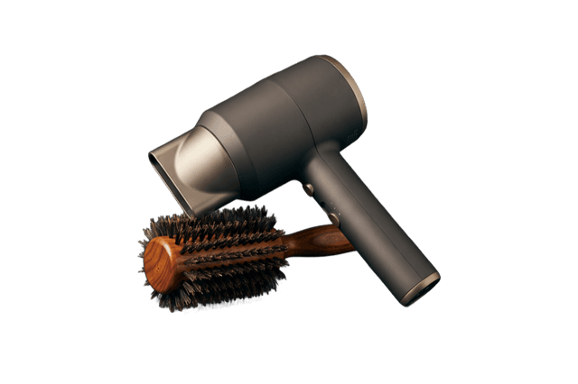 A salon blow dryer and round brush